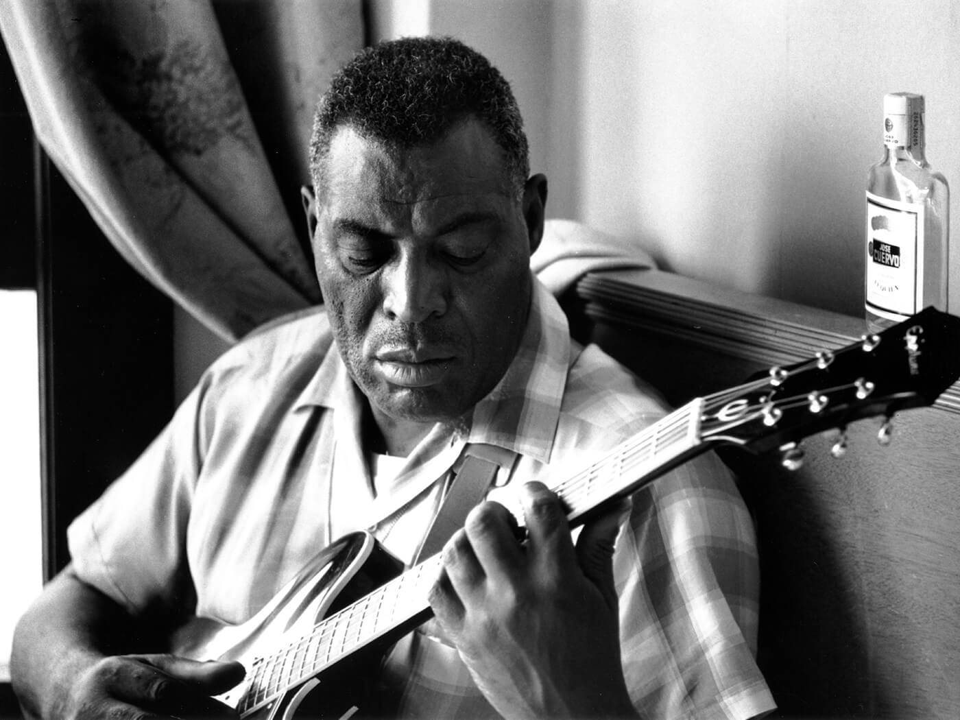 Howlin Wolf Blues Singer And Guitarist Photo Background