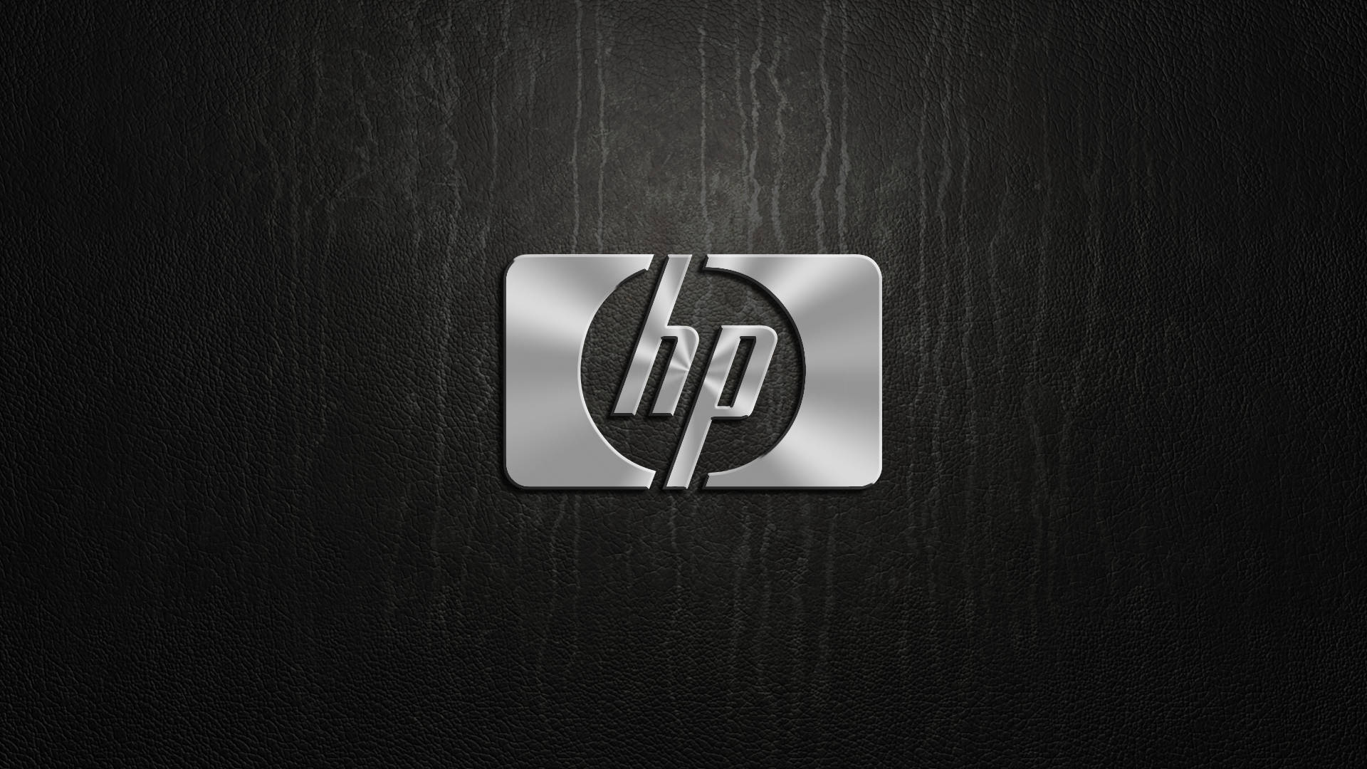 Hp Laptop Logo On Leather Background