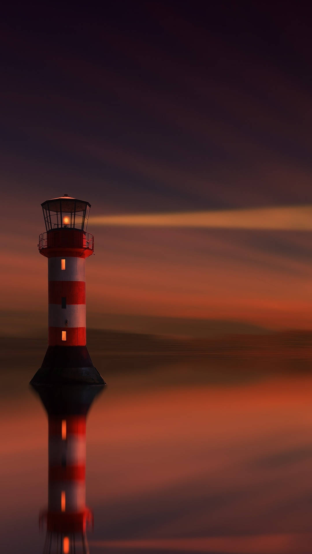 Htc Lighthouse On Sunset Background