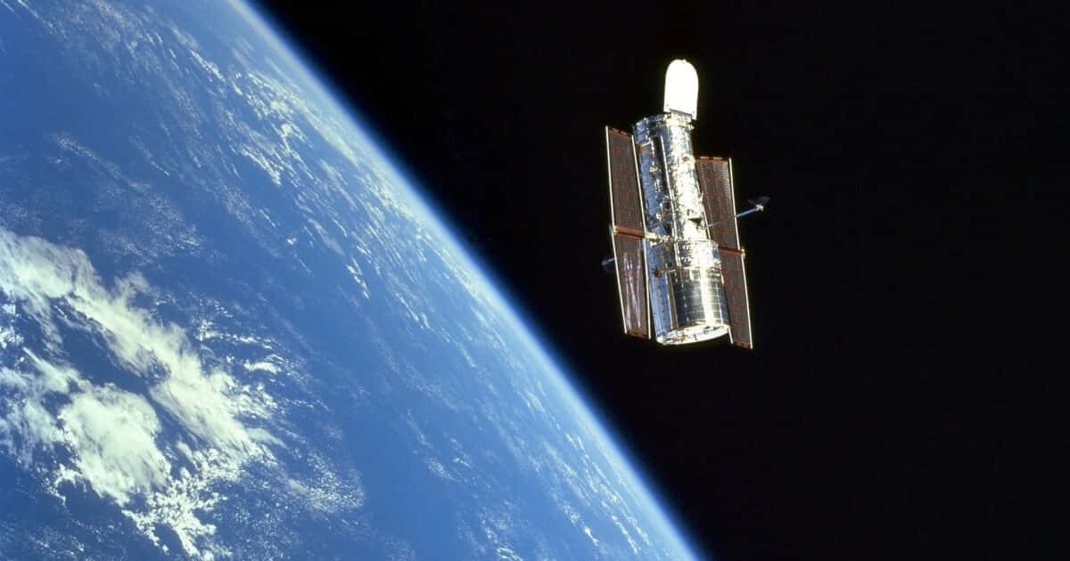 Hubble Space Telescope Orbiting Earth Background