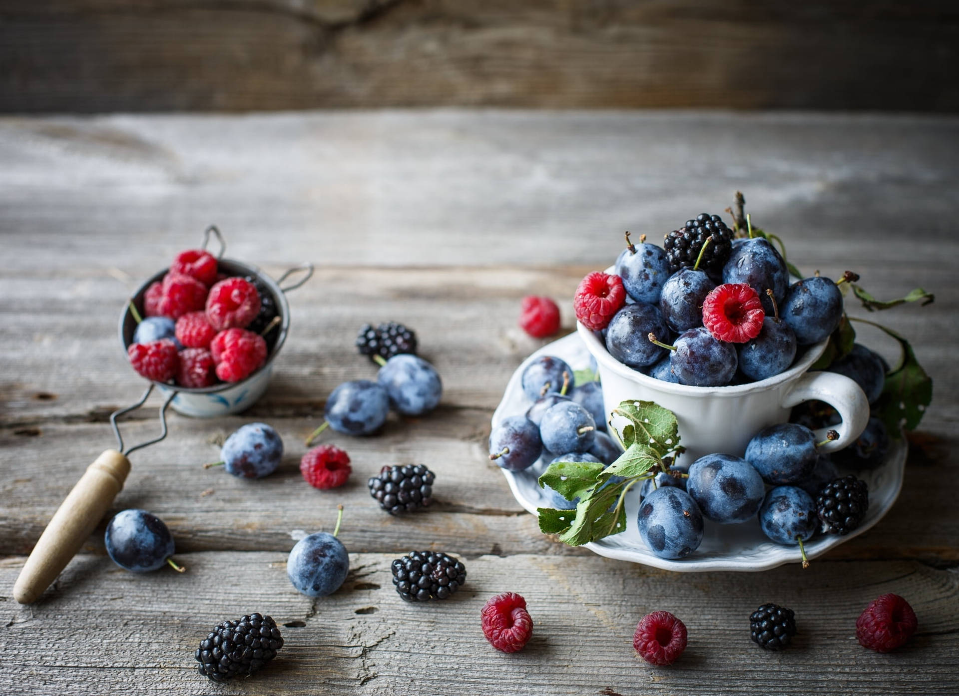 Huckleberry With Different Berries Background