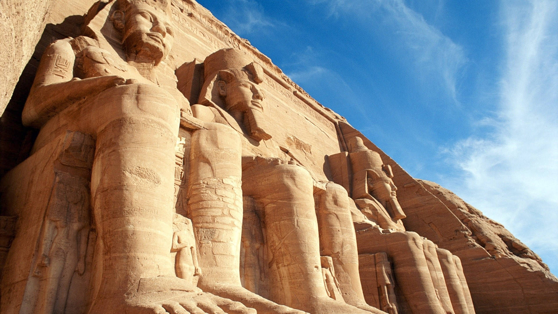 Huge Colossal Statues In Abu Simbel Background