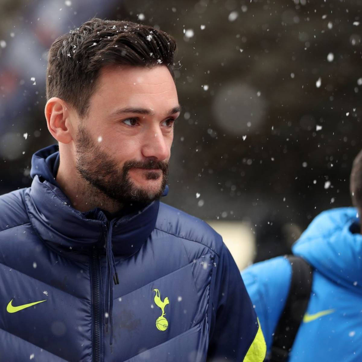 Hugo Lloris - The Goalkeeper Star Standing Confidently On A Snowy Day
