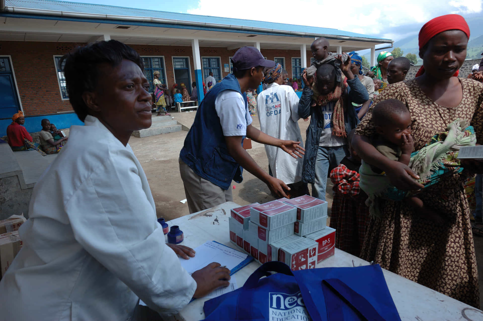 Humanitarian Worker In Action Background