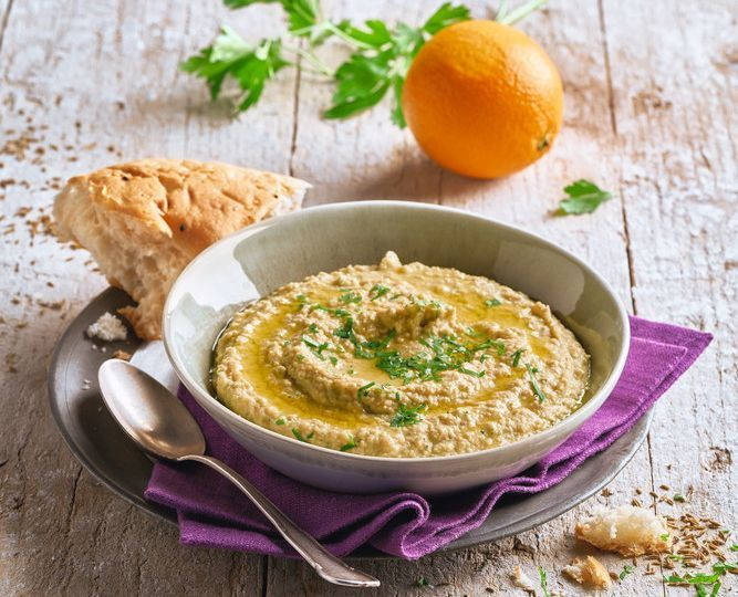 Hummus With Bread And Orange Background