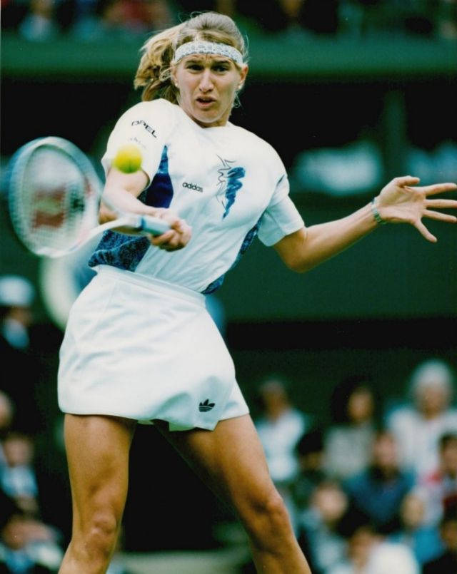 Humorous Moment With Steffi Graf Background