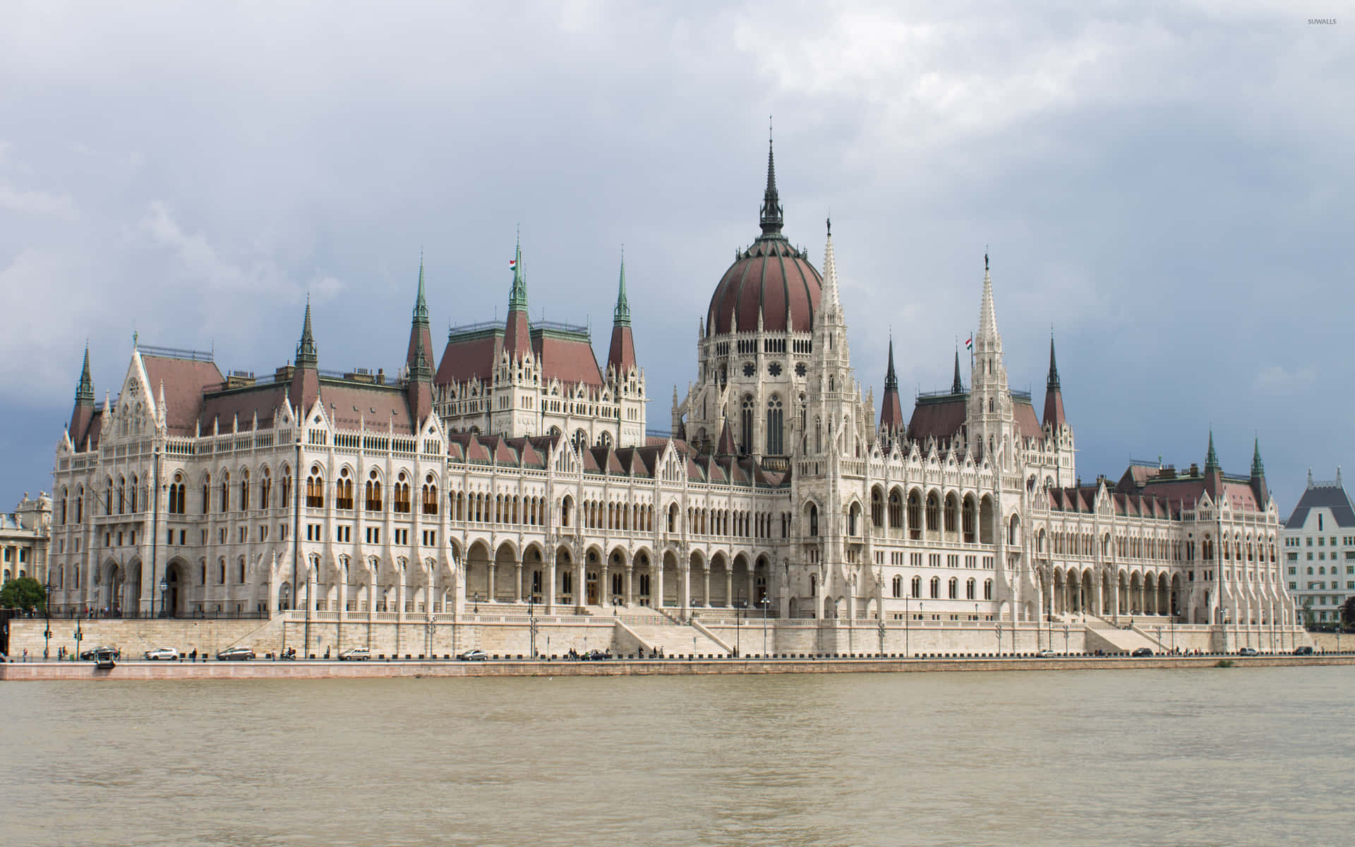 Hungarian Parliament Buildings With Cloudy Sky Background