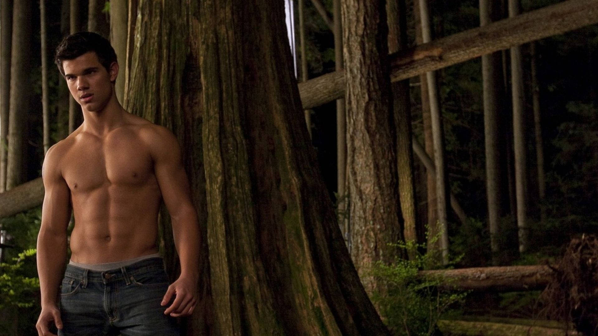 Hunk Taylor Lautner In Forest Background