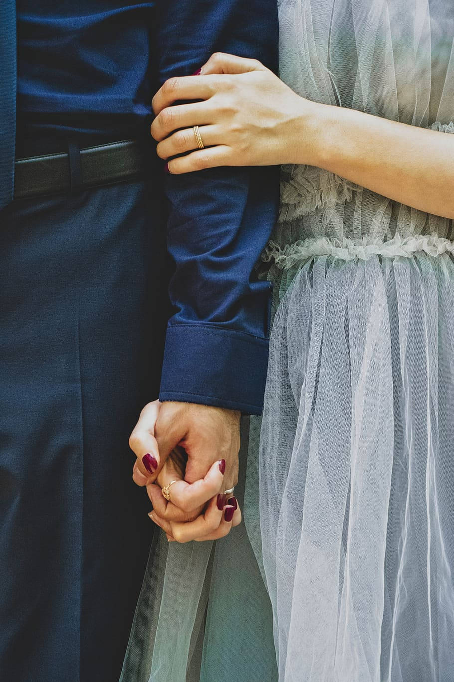 Husband And Wife Holding Hands Background