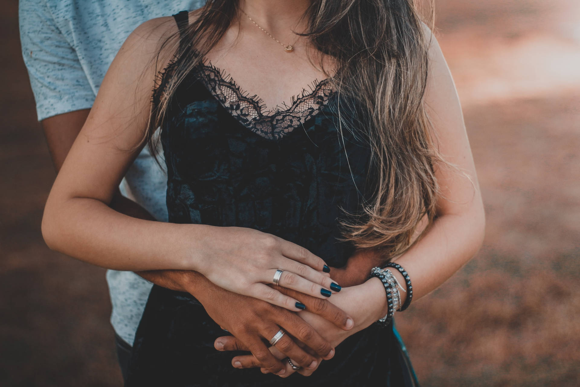 Husband And Wife In Couple Hugging Position Background