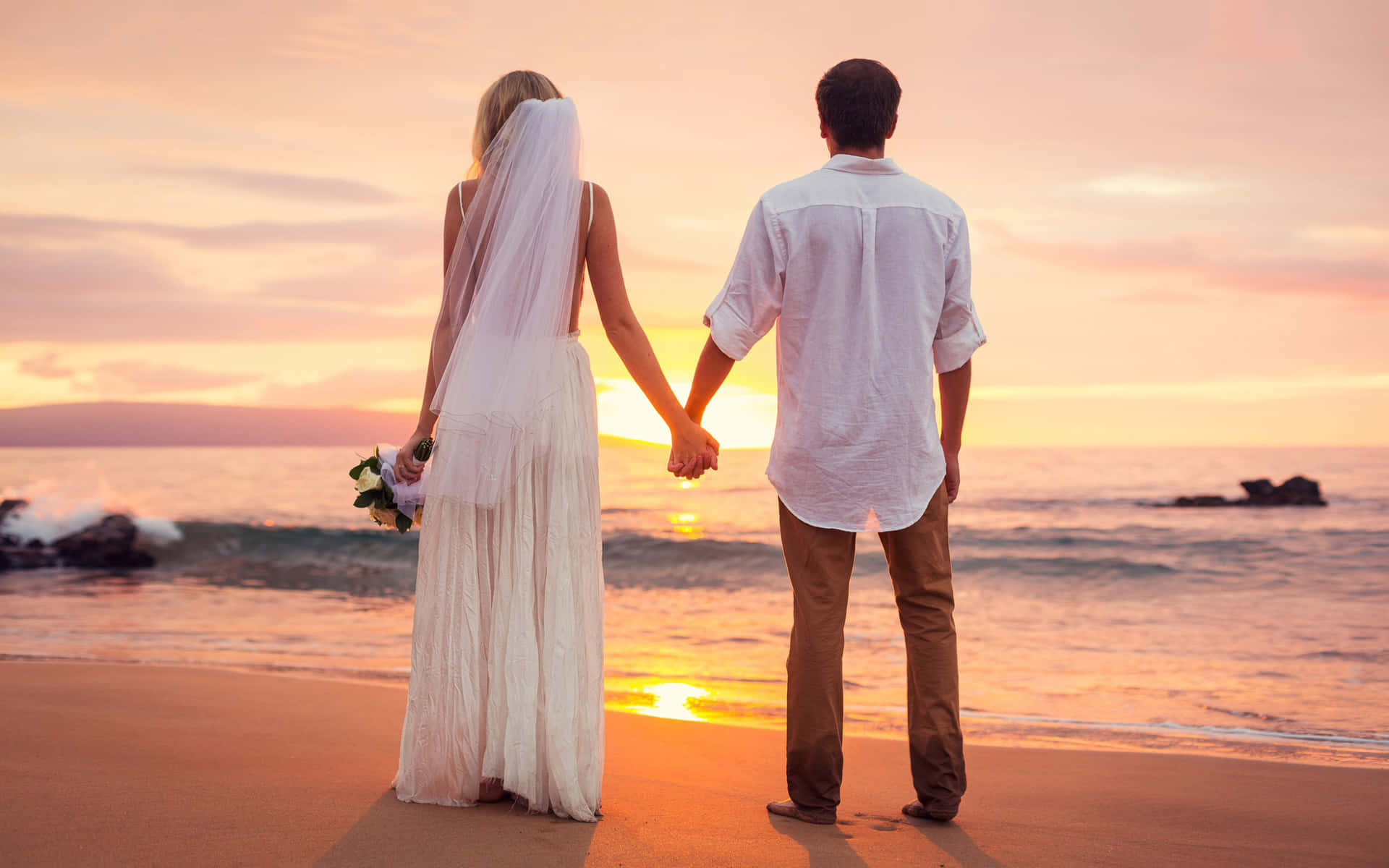 Husband And Wife Sunset Wedding On Beach Background