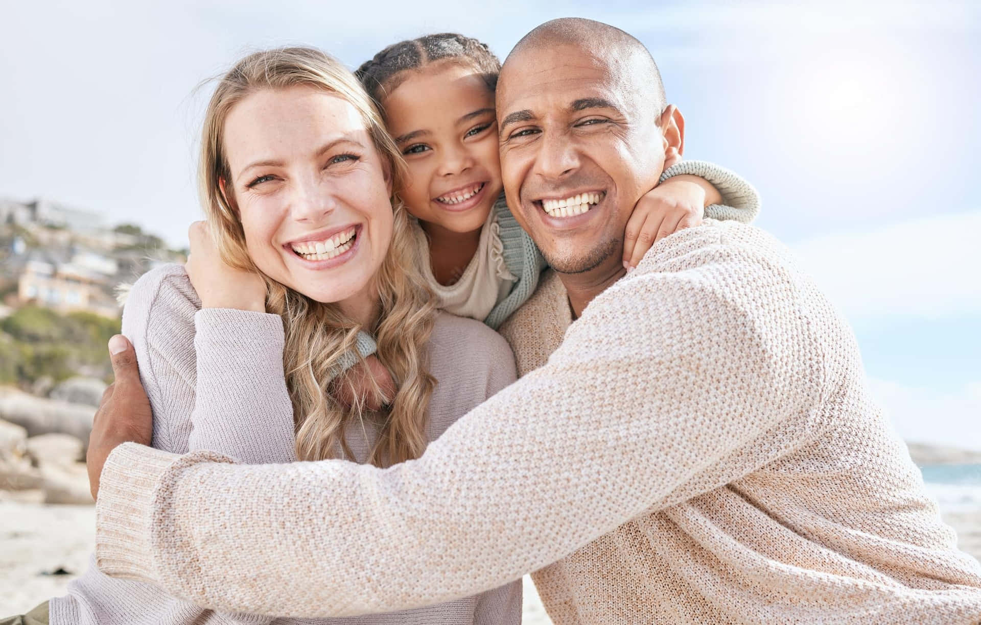 Husband And Wife With Daughter