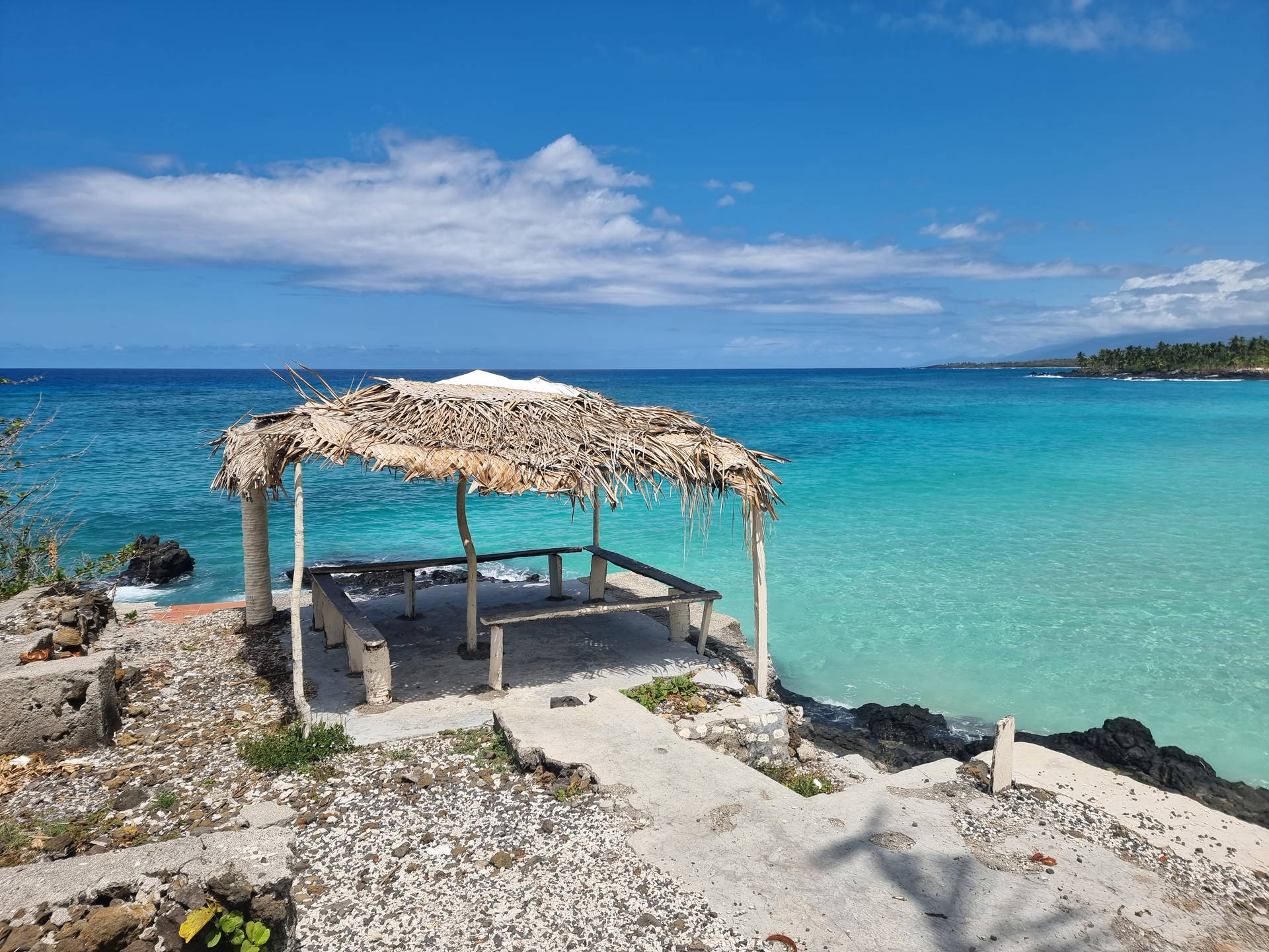 Hut Overlooking Beach In Comoros Background