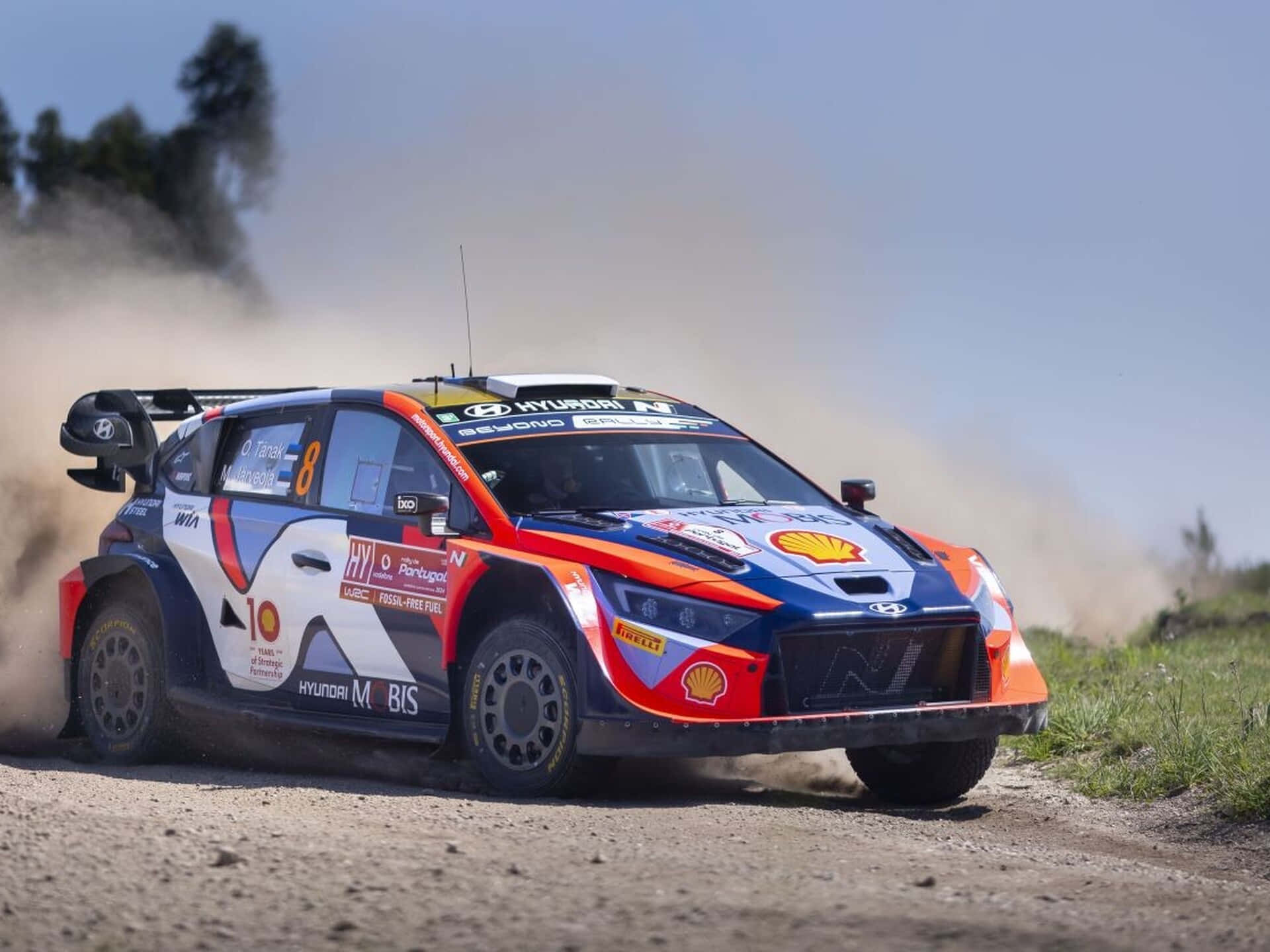 Hyundai Rally Car Dust Trail Background