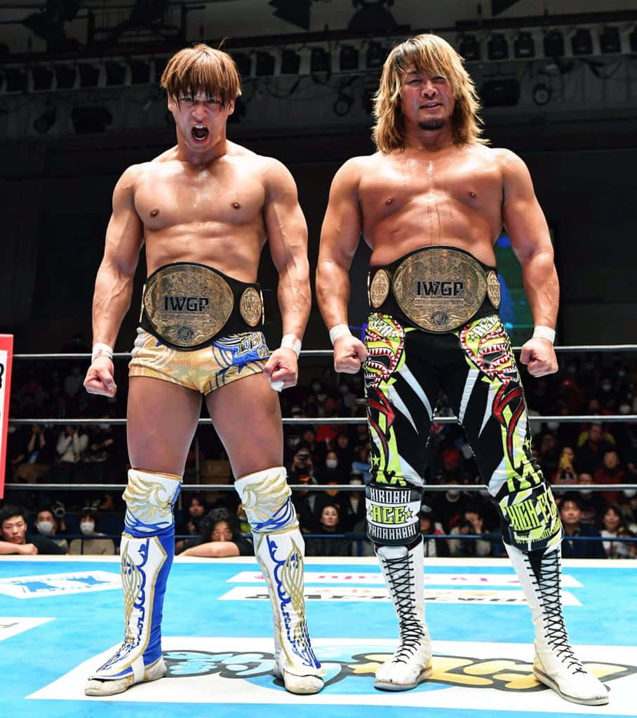 I W G P_ Tag_ Team_ Champions_ Tanahashi_and_ Partner Background