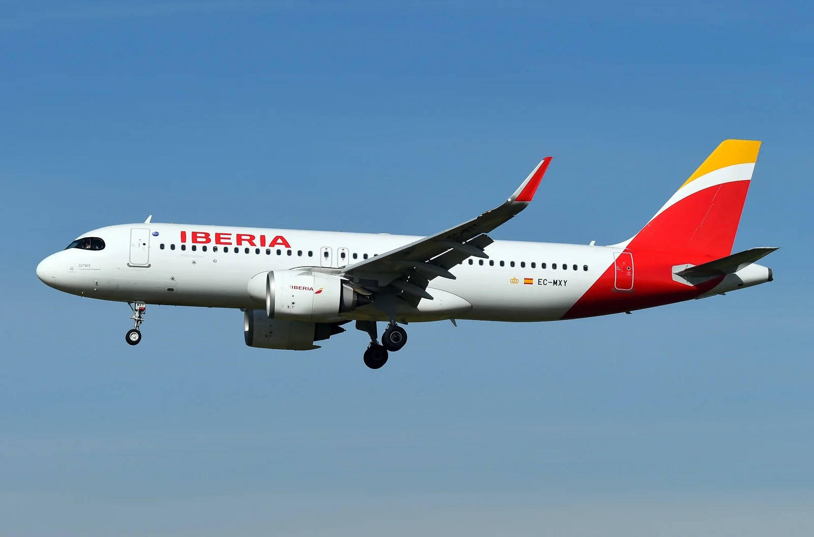 Iberia Airlines Airplane Clear Blue Sky Background