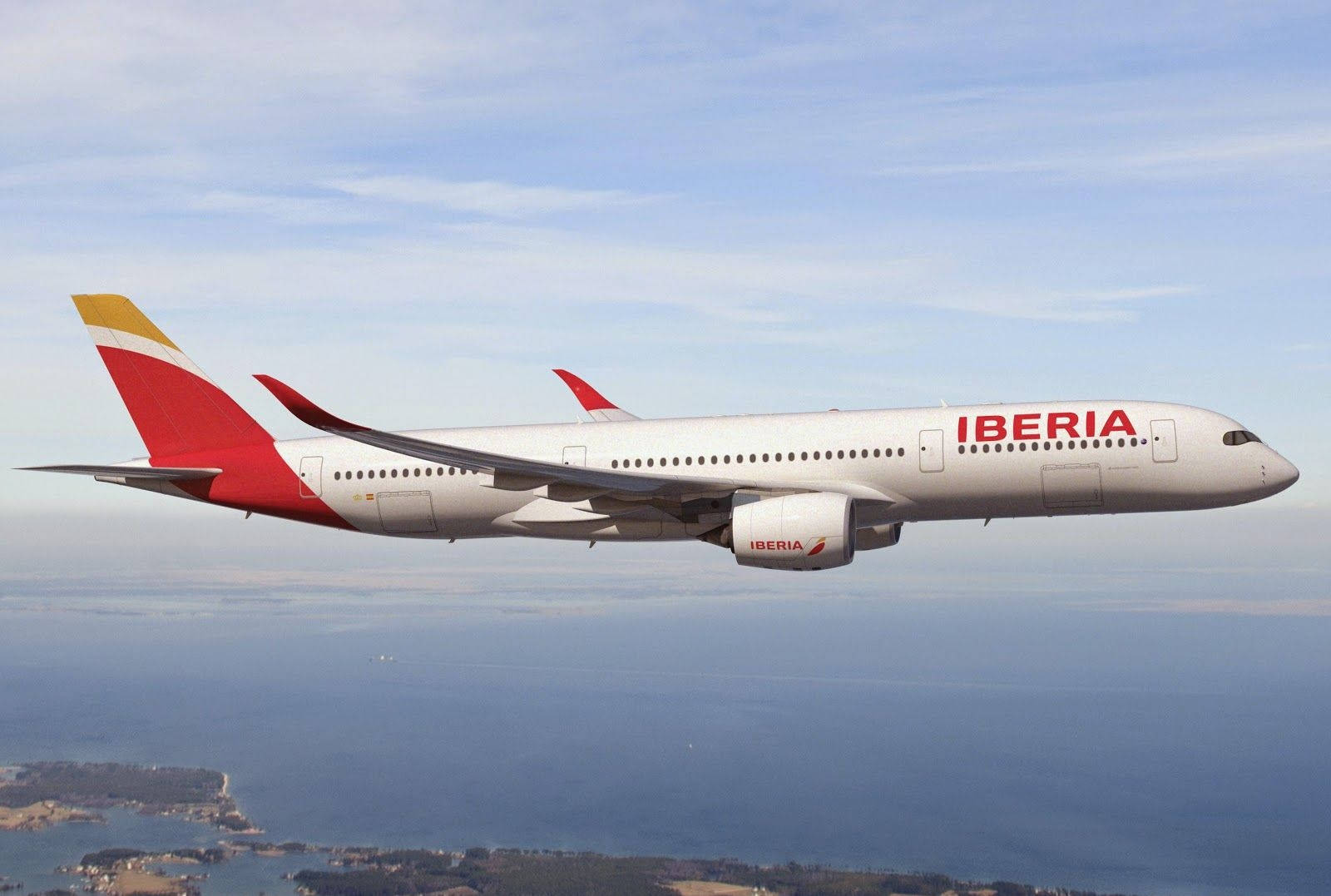 Iberia Airlines Airplane Flying Above Ocean