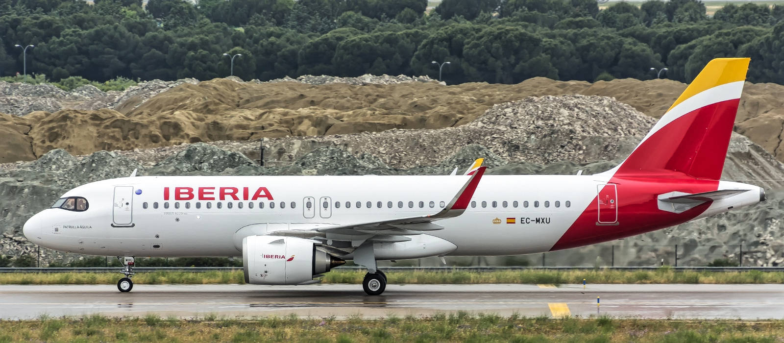 Iberia Airlines Airplane Side View On Runway