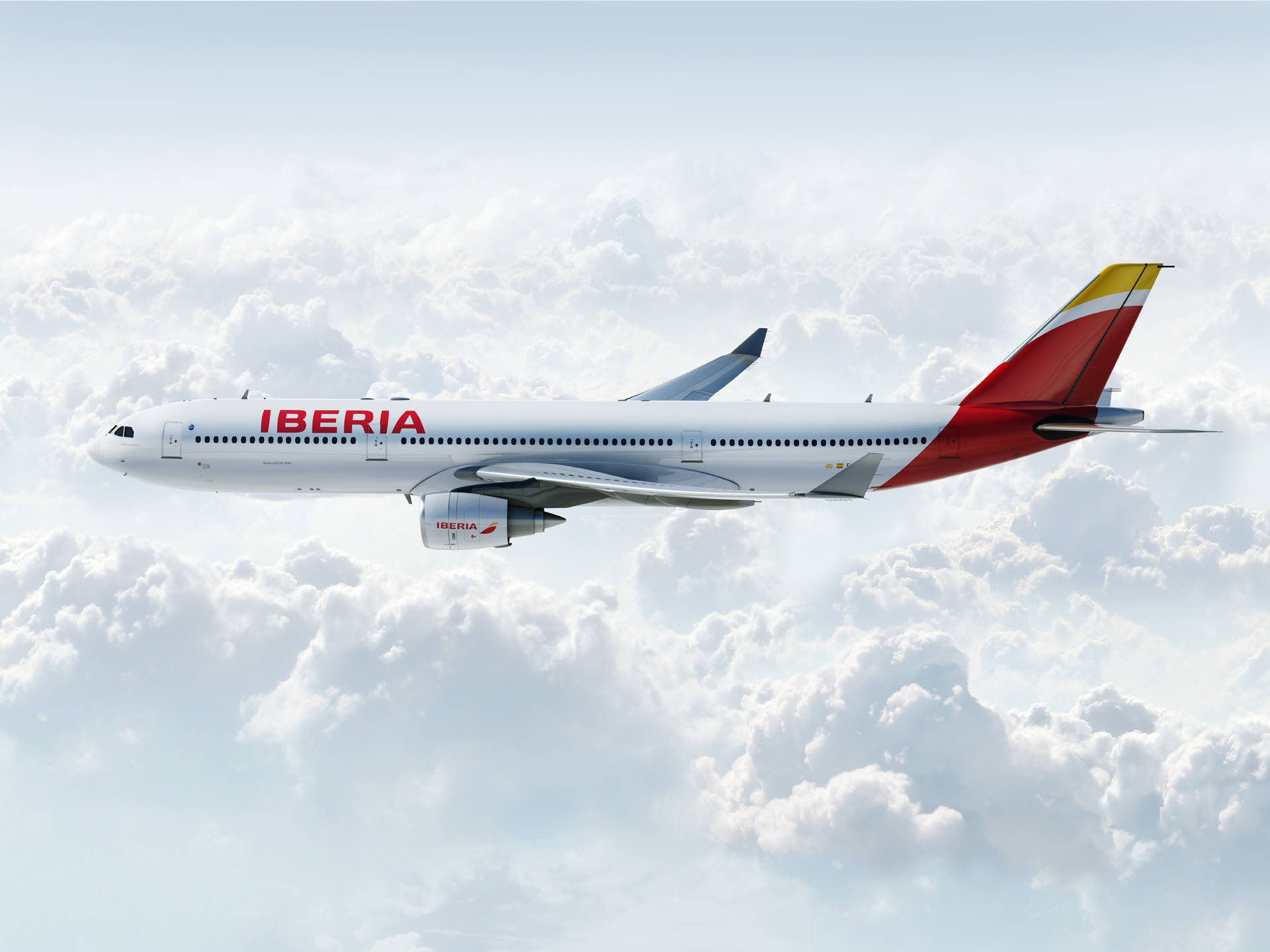 Iberia Airlines Airplane White Cloudy Skies Background