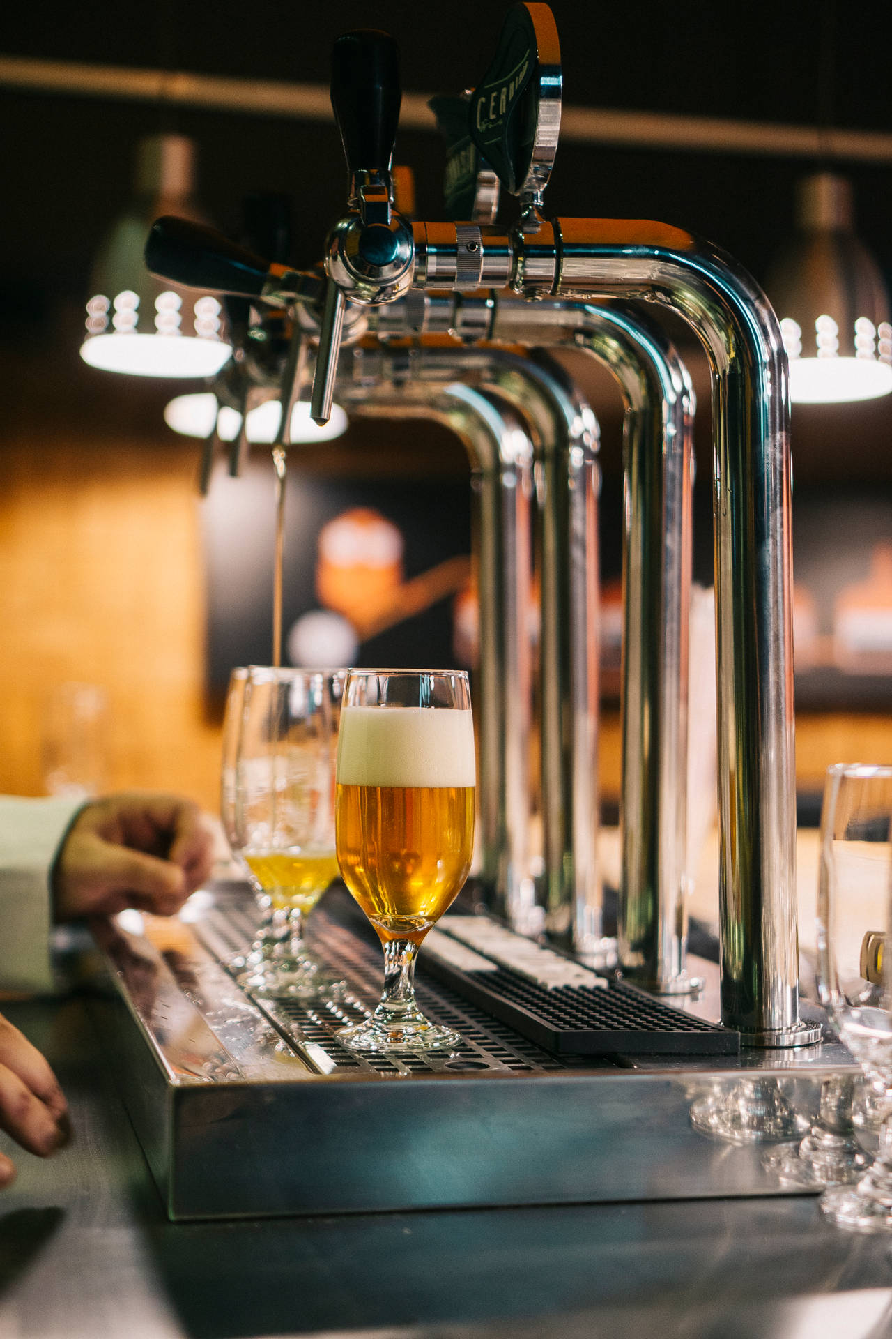 Ice-cold Beer On Tap In A Luxury Setting Background