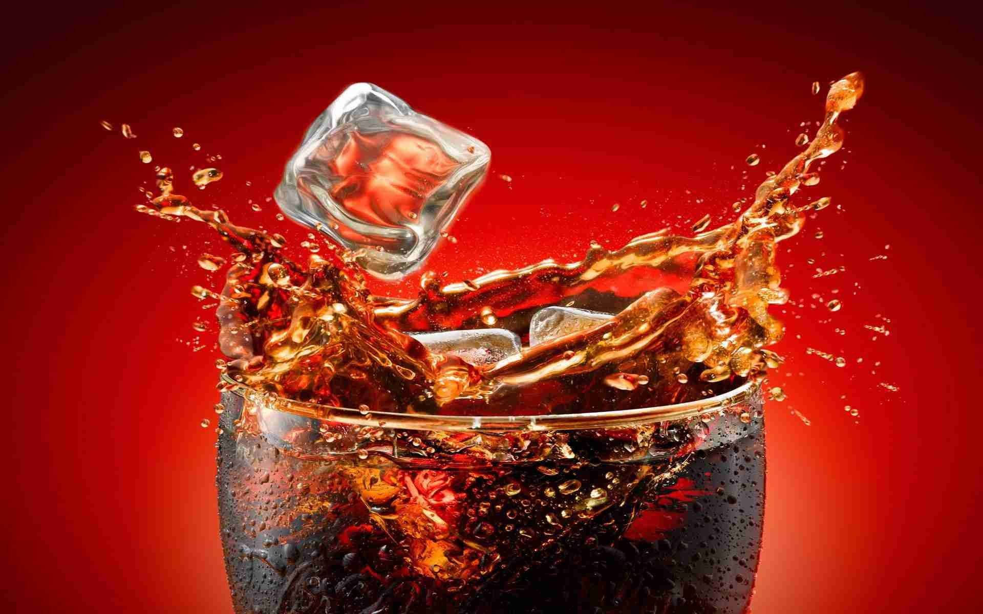 Ice Cube On Cola Drink Background