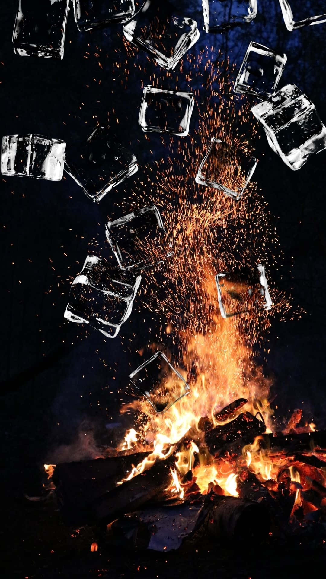 Ice Cubes Falling From A Fire Background