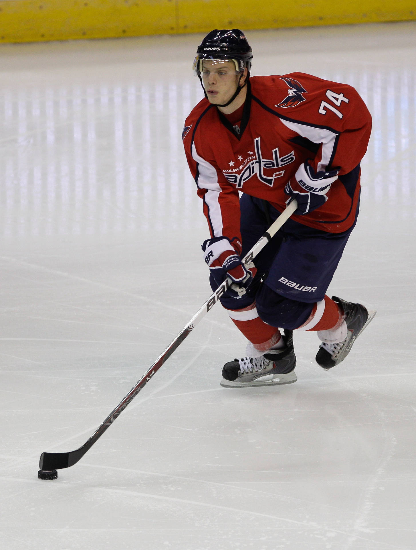 Ice Hockey Defenseman John Carlson On Field Background