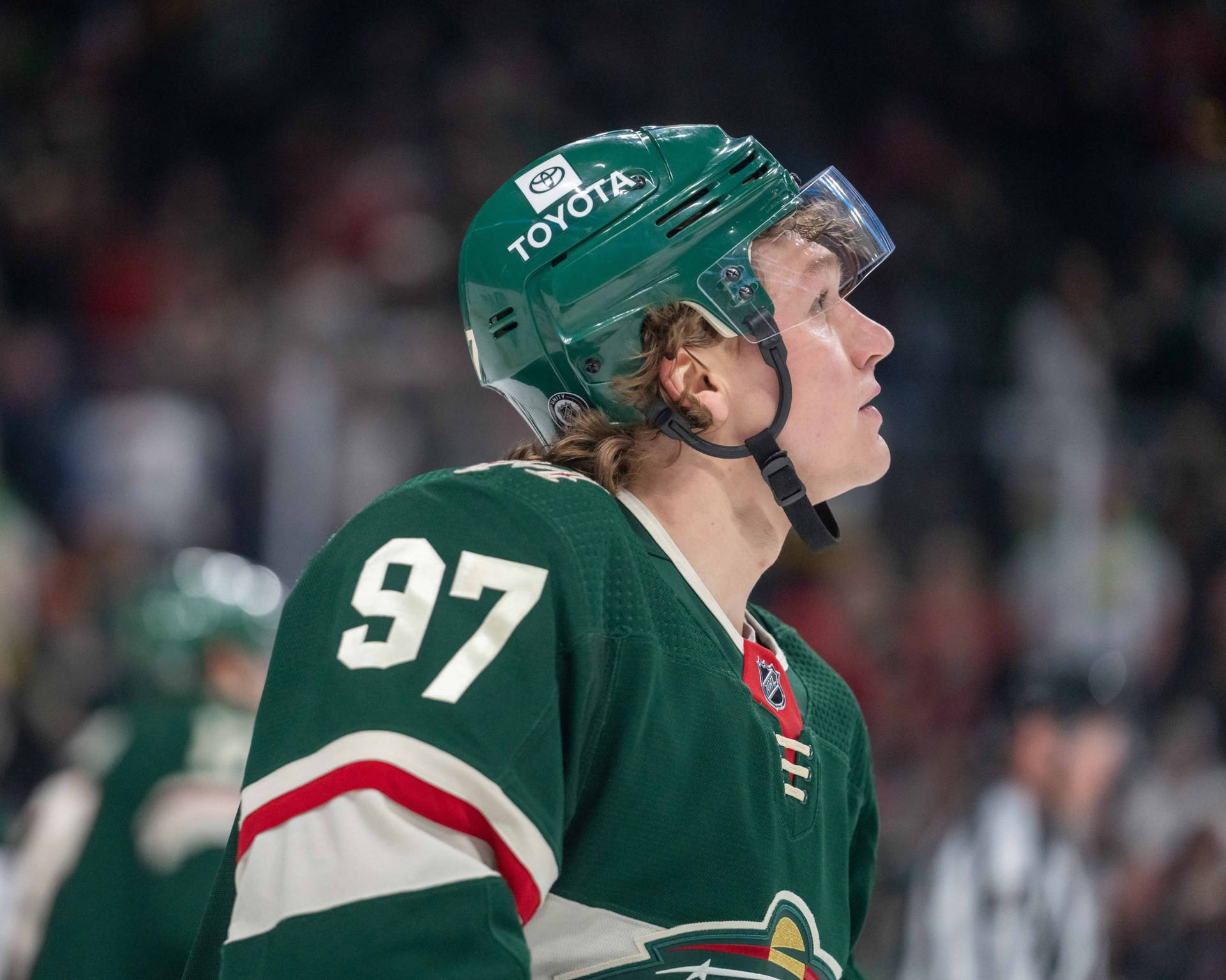 Ice Hockey Star Kirill Kaprizov Looking Up Background