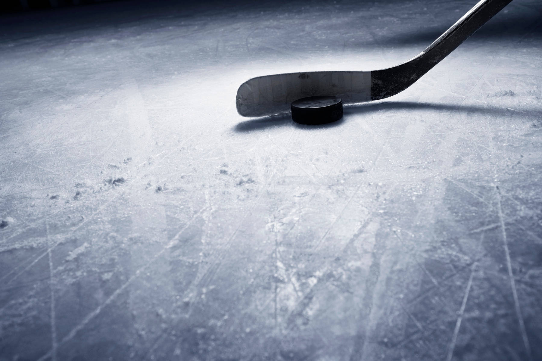 Ice Hockey Stick And Puck Close Up Background