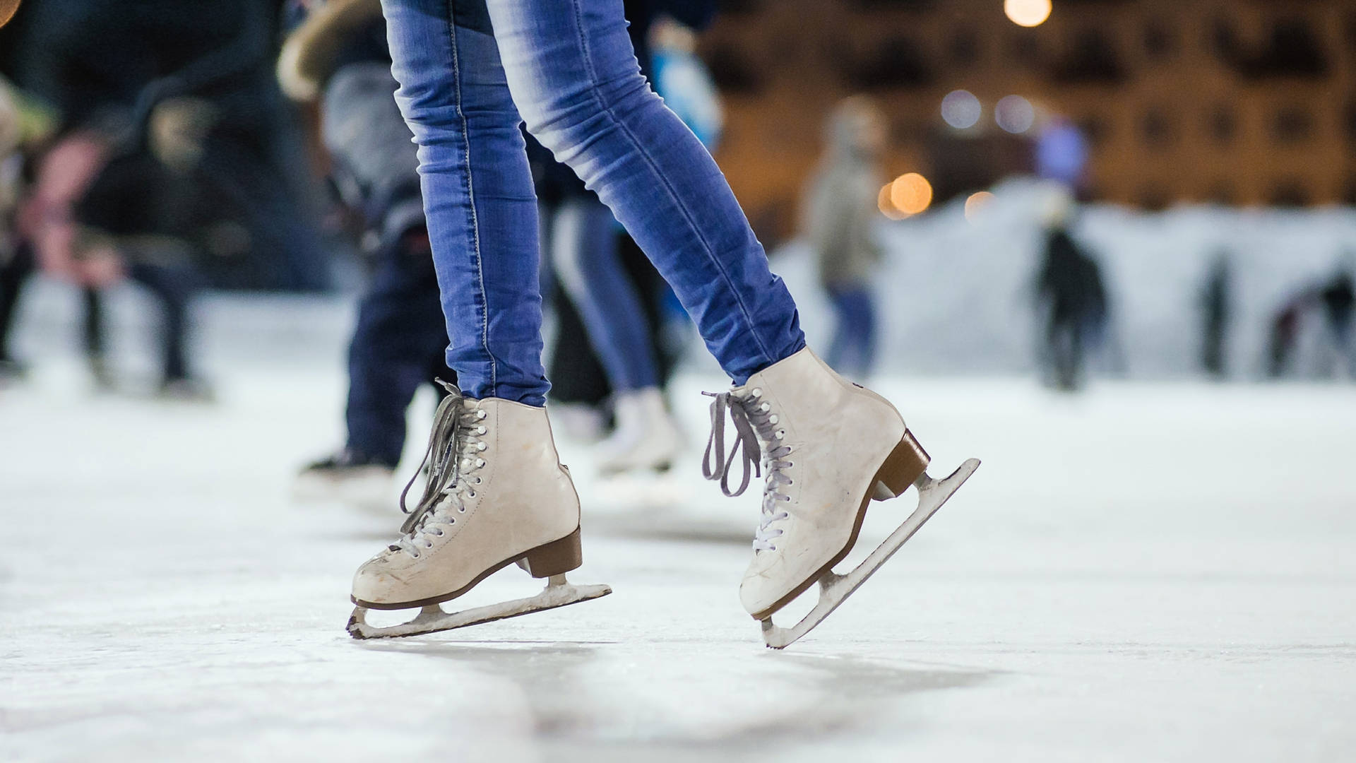 Ice Skating Shoes On Chilly Rink Background