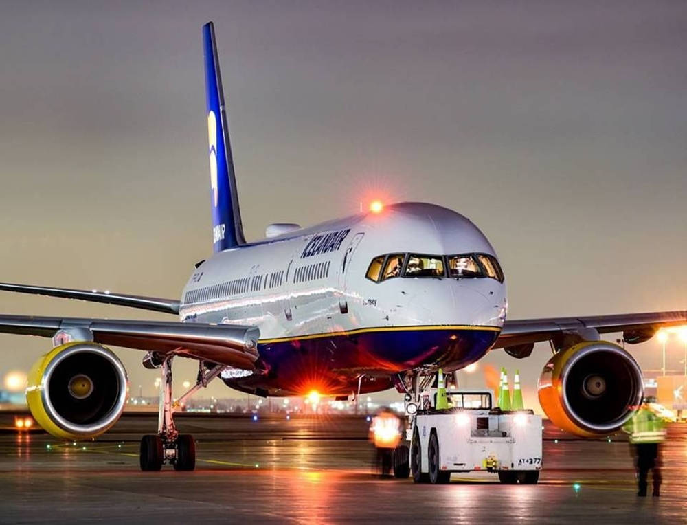 Icelandair Airplane Preparing To Board Background