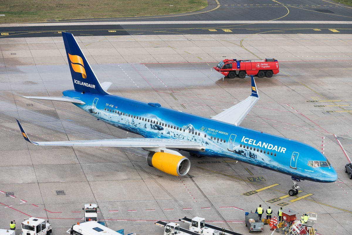 Icelandair Blue Plane On Tarmac Background