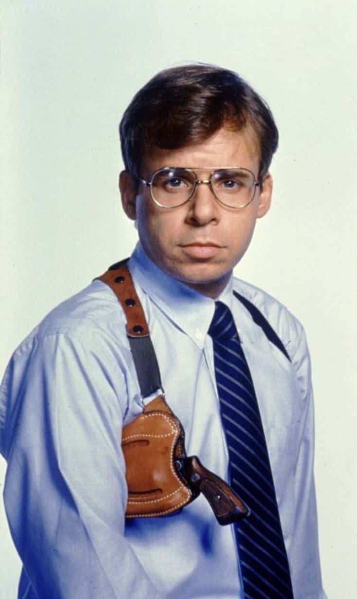 Iconic 80s Actor Rick Moranis Background