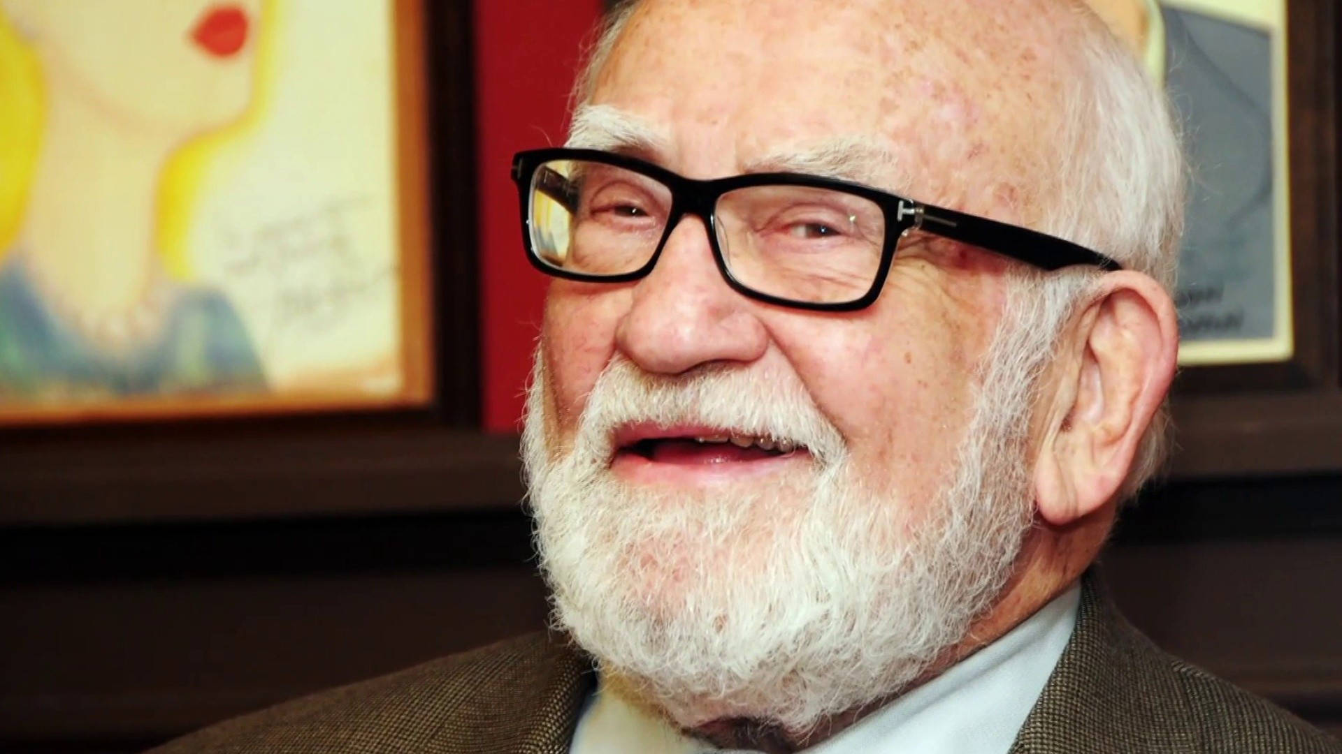 Iconic Actor Edward Asner Wearing Black Glasses Background