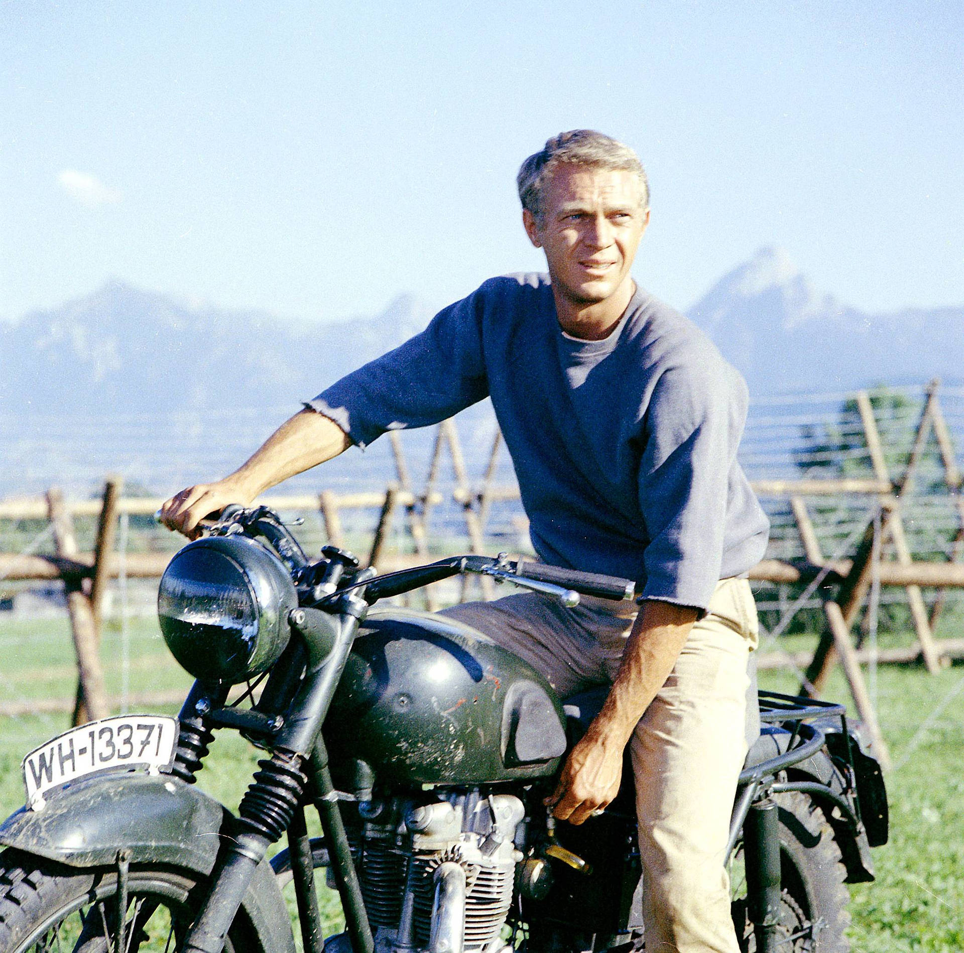 Iconic American Actor, Steve Mcqueen In Character Background