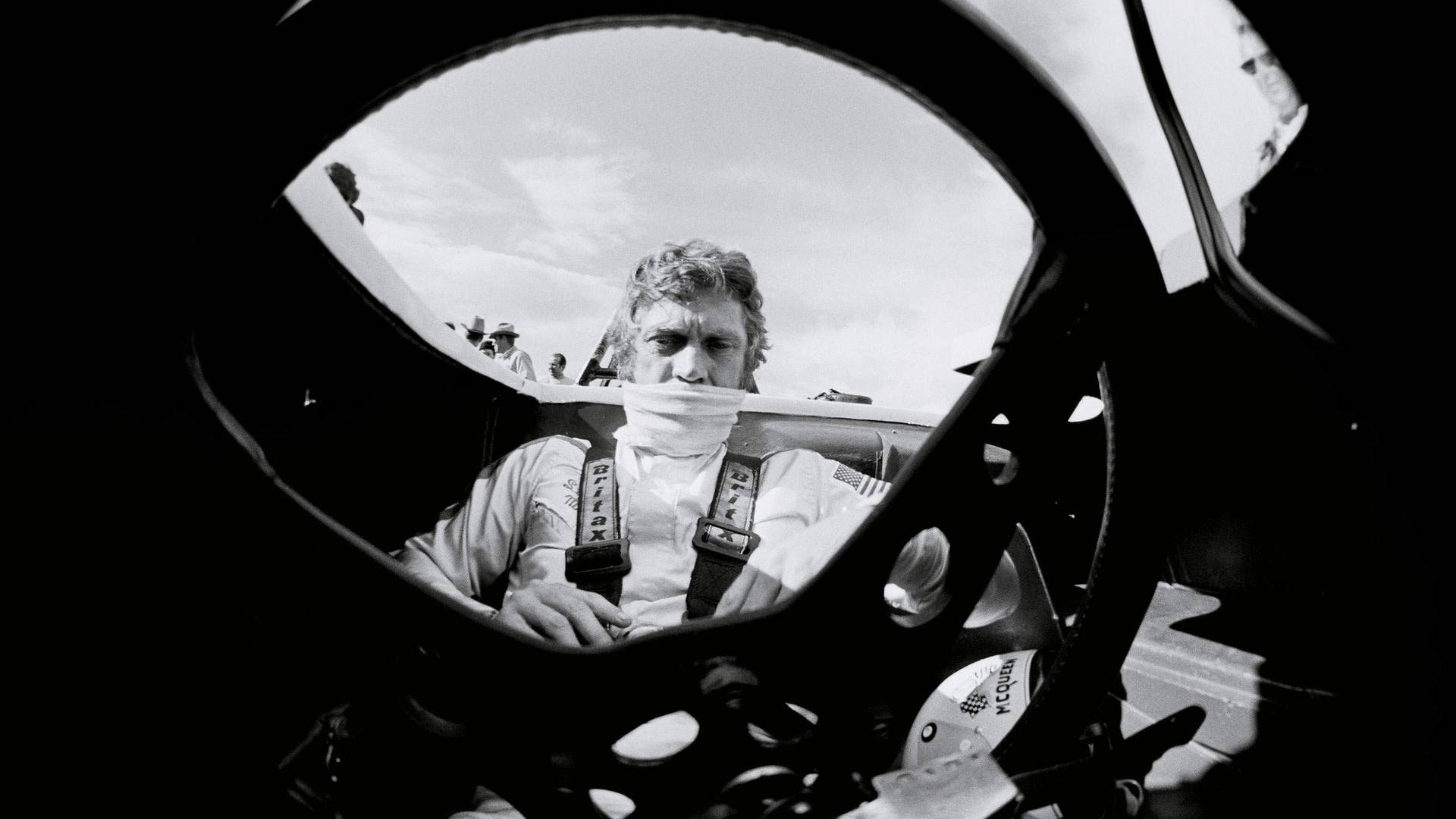 Iconic American Actor Steve Mcqueen Poses In ‘the Man And Le Mans’ Background