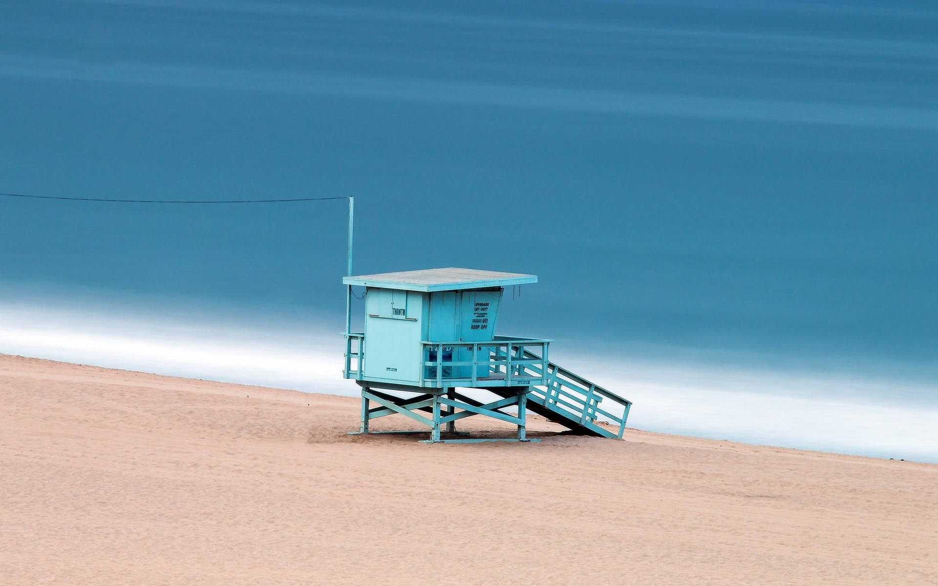 Iconic Blue Lifeguard Tower At Venice Beach Background