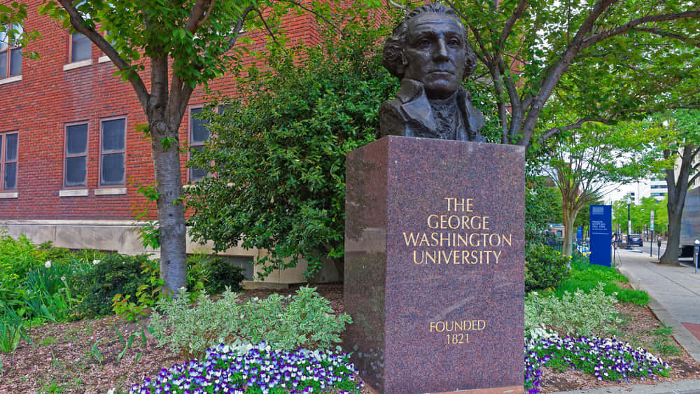 Iconic Bronze Statue Of George Washington At George Washington University. Background