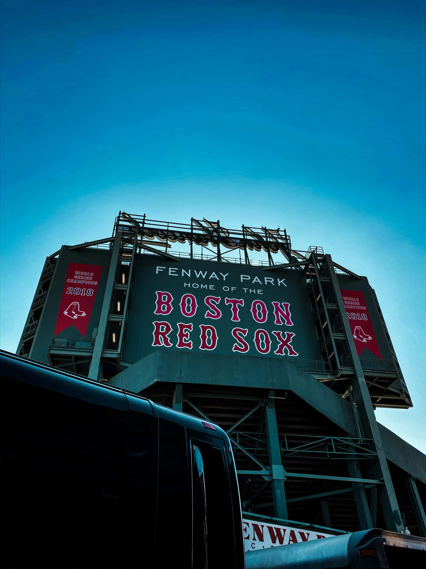 Iconic Fenway Park At Night Background