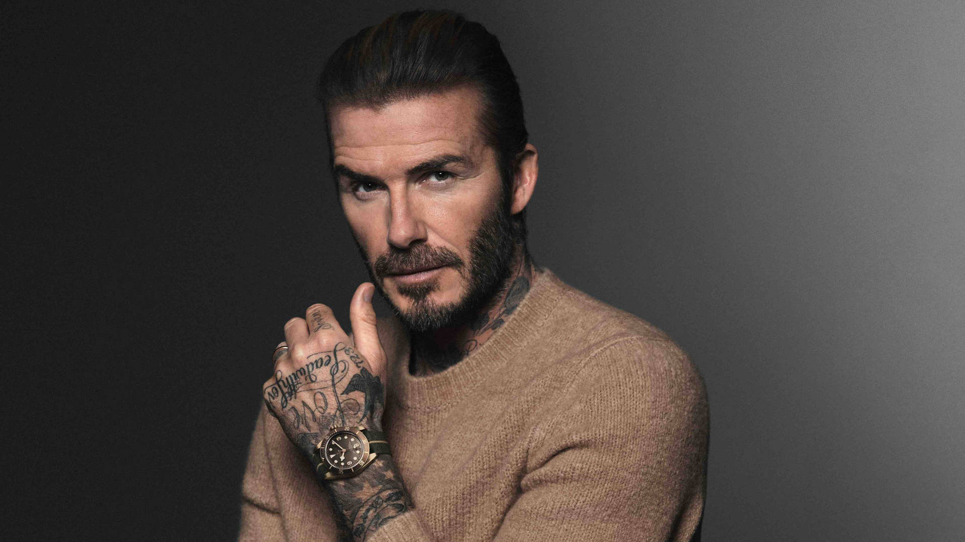 Iconic Football Star David Beckham As A Tudor Ambassador Background
