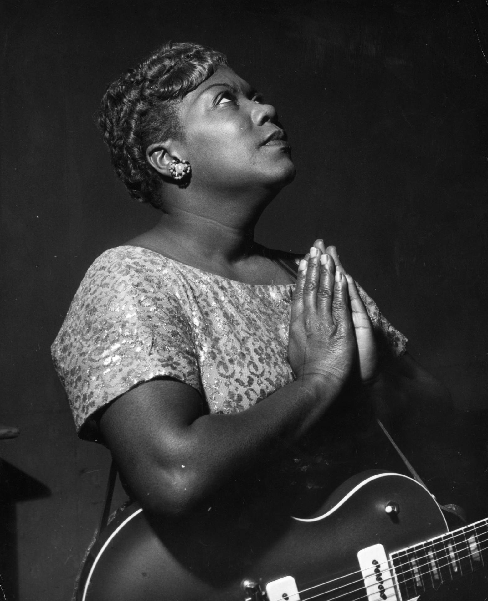 Iconic Gospel Singer, Sister Rosetta Tharpe, In Praying Stance Background