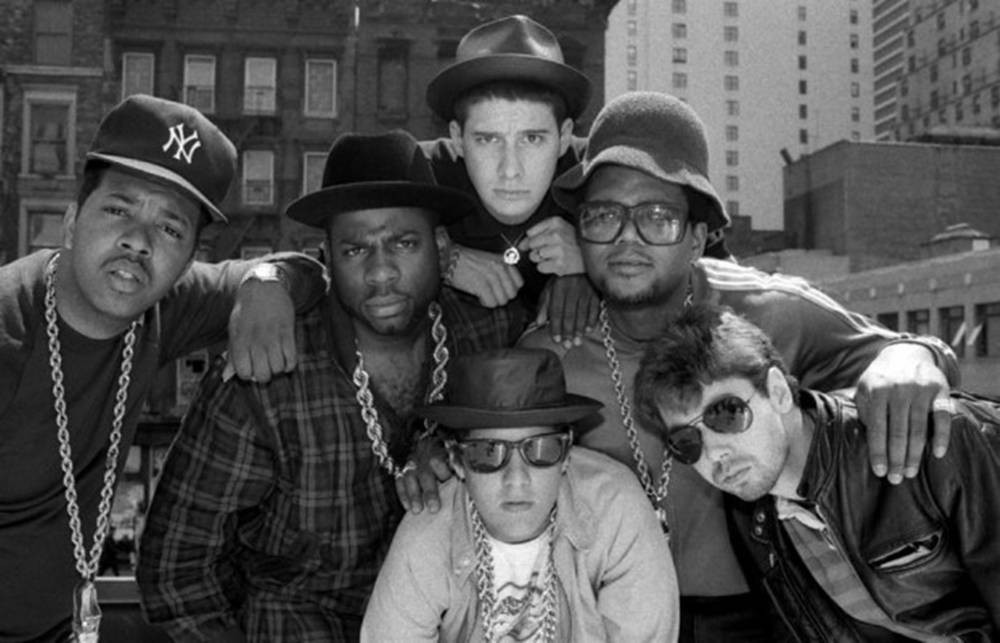 Iconic Hip-hop Legends - Beastie Boys And Run-d.m.c. In One Frame Background