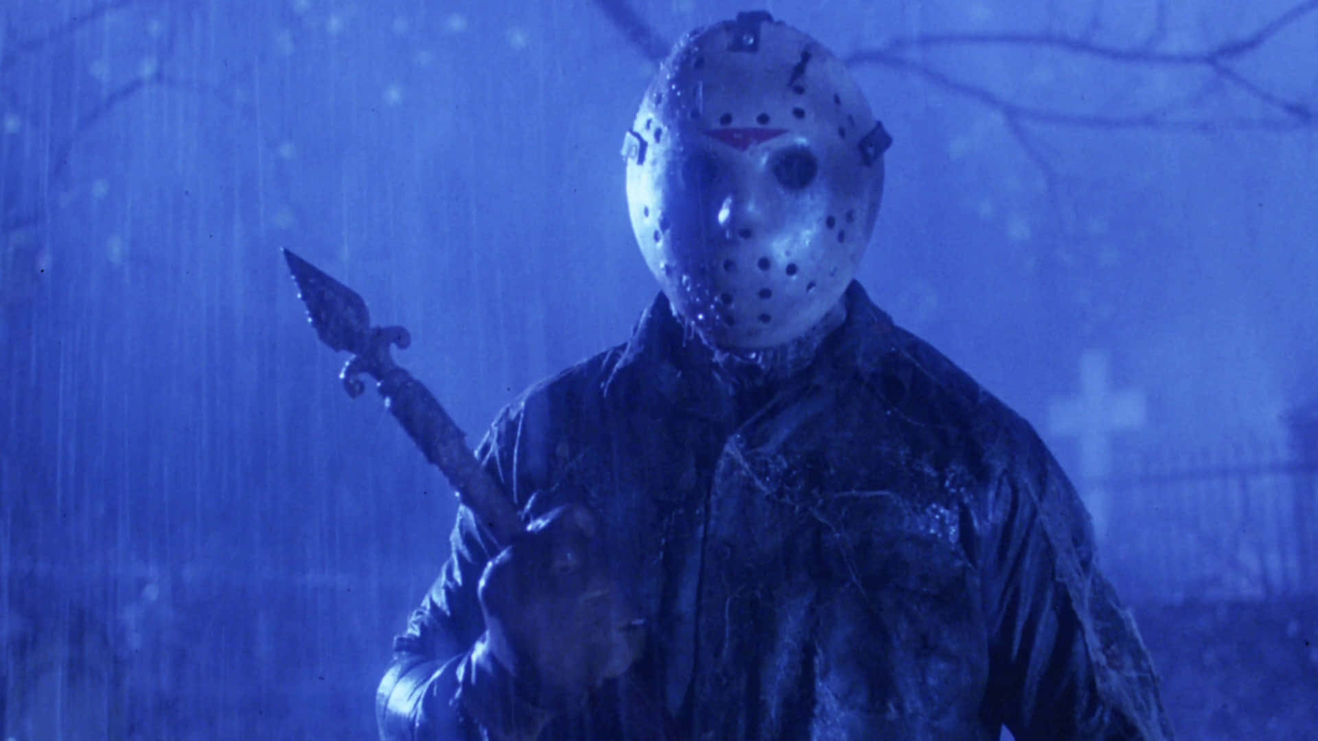 Iconic Horror Movie Characterin Rain Background