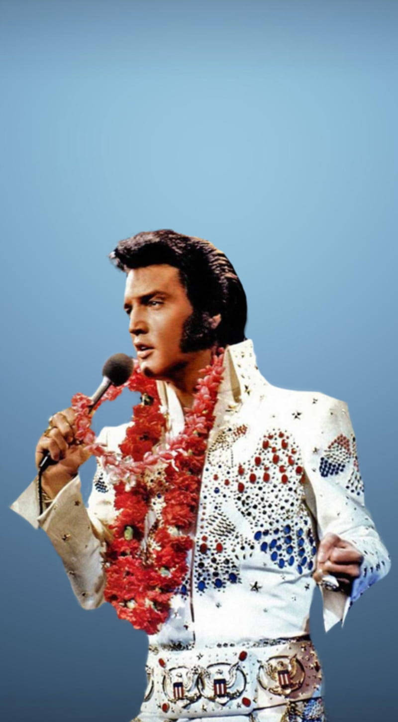 Iconic Image Of Elvis Presley Against A Striking Blue Backdrop Background