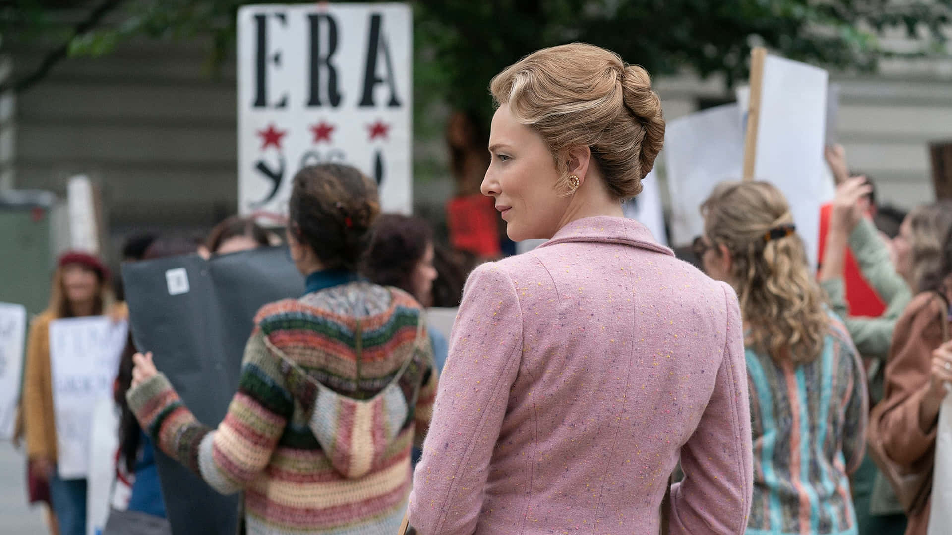 Iconic Leader Phyllis Schlafly Addressing A Protest Background