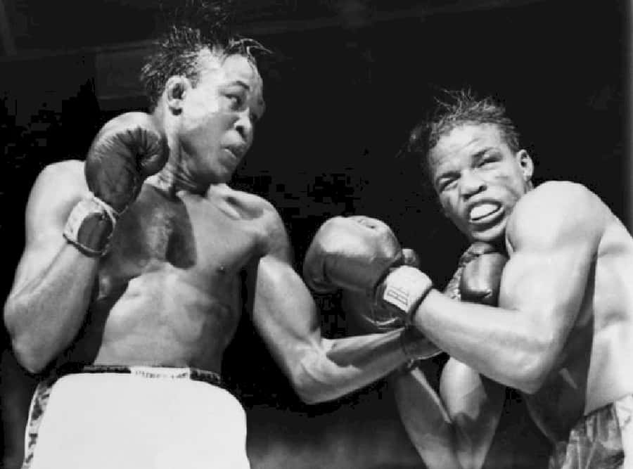 Iconic Moment Of Kid Gavilan Delivering Surprising Punch Background