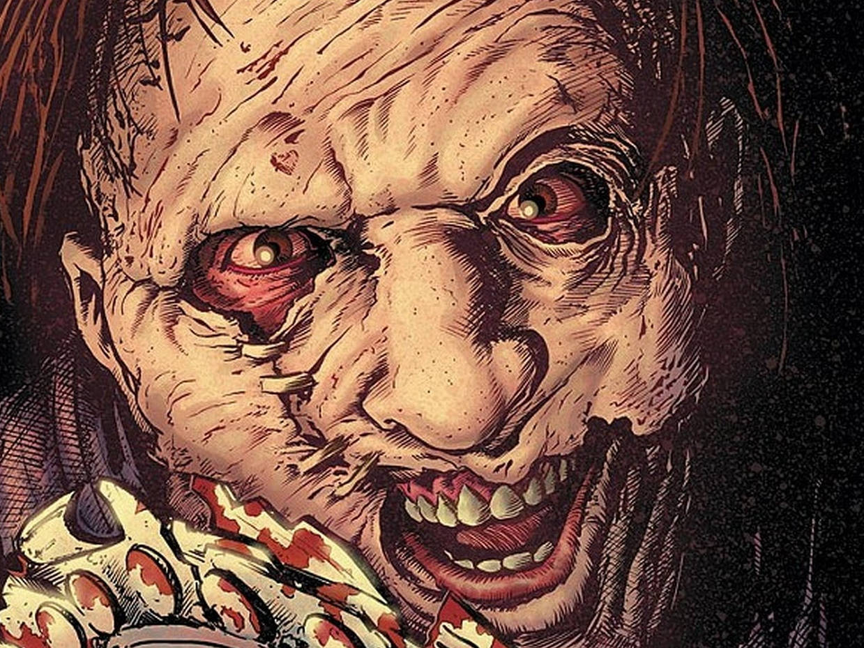 Iconic Monster Unmasked - Close-up Of Comic's Leatherface Background