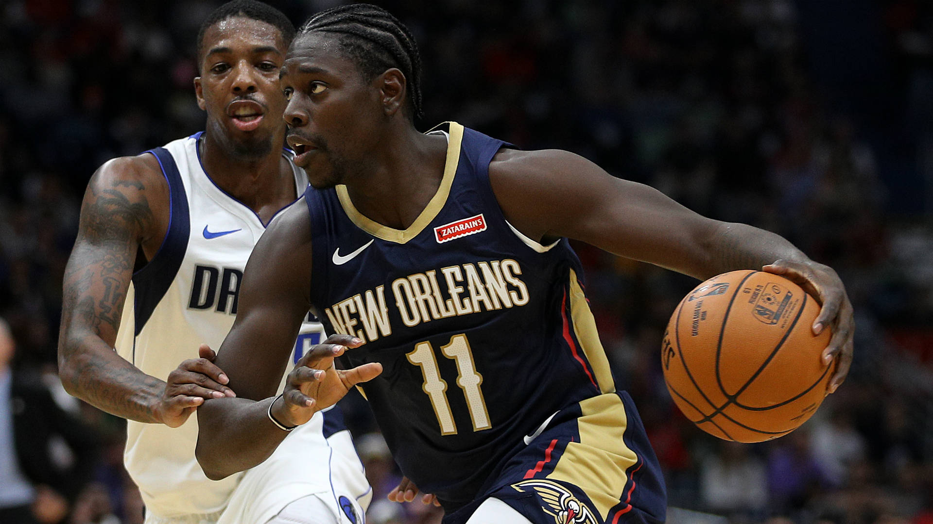 Iconic Nba Player, Jrue Holiday In Action Background