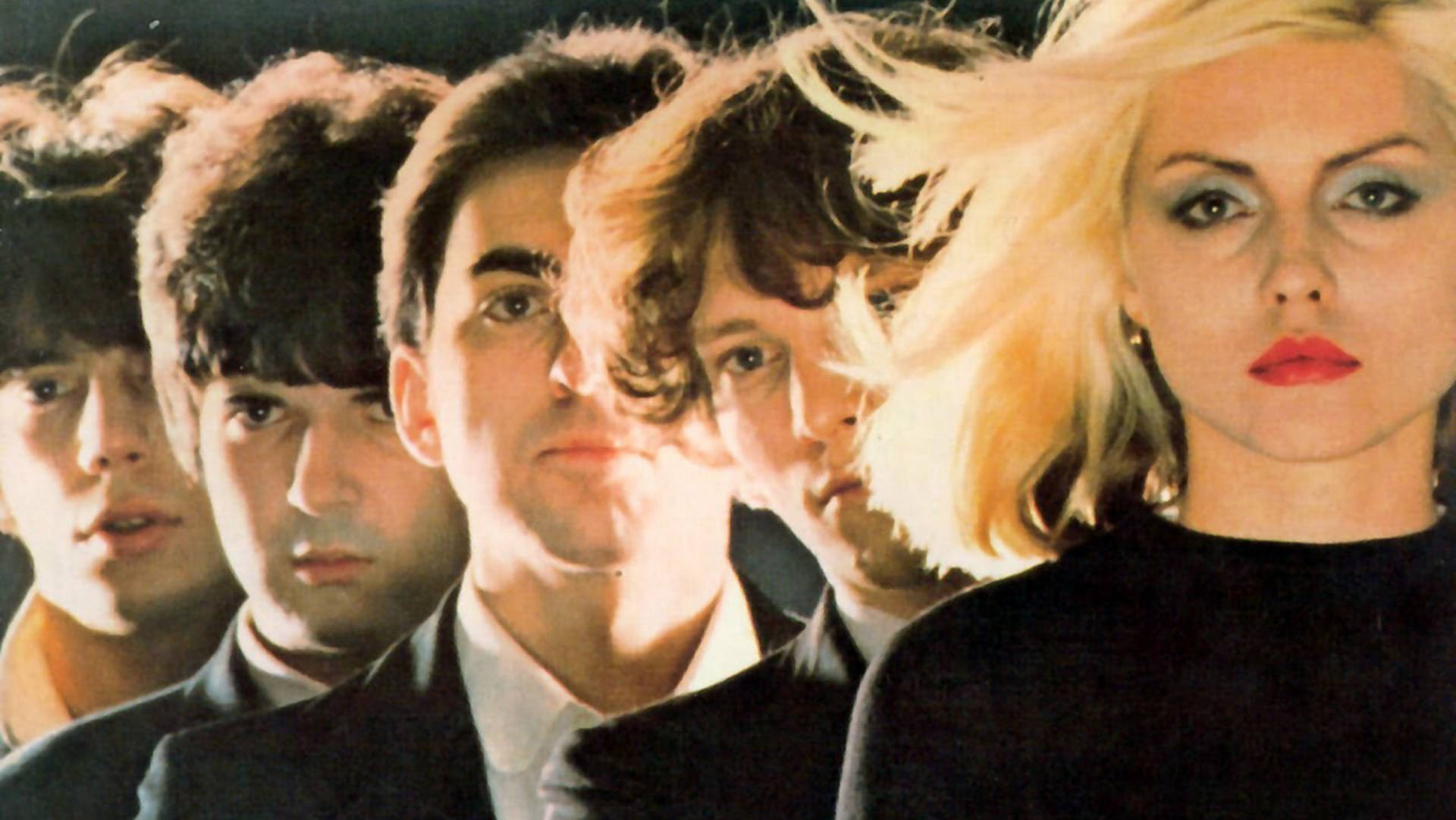 Iconic Portrait Of Blondie, The Legendary American Rock Band, During An Album Photo Shoot. Background