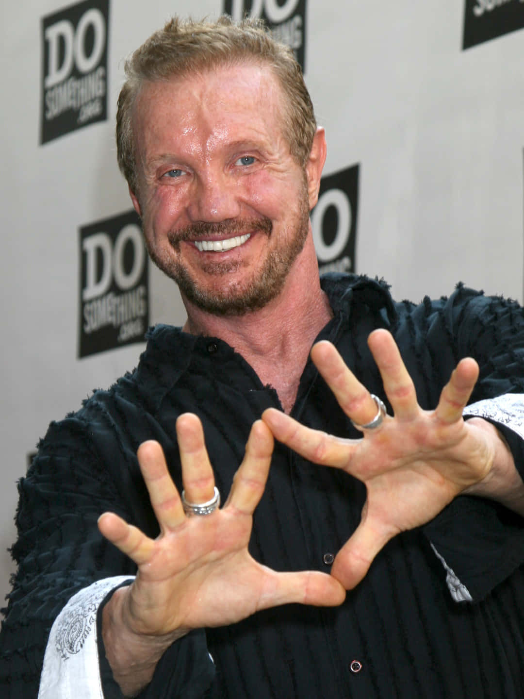 Iconic Portrait Of Diamond Dallas Page Background